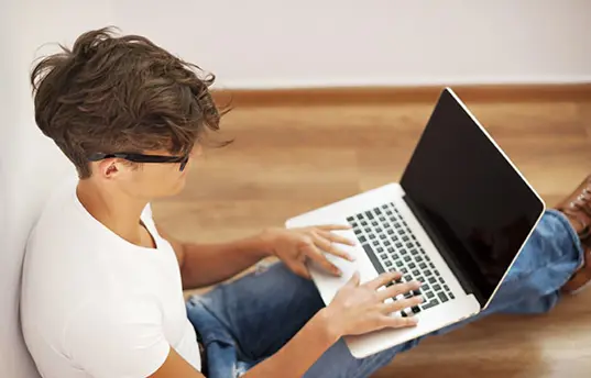 Student on laptop computer