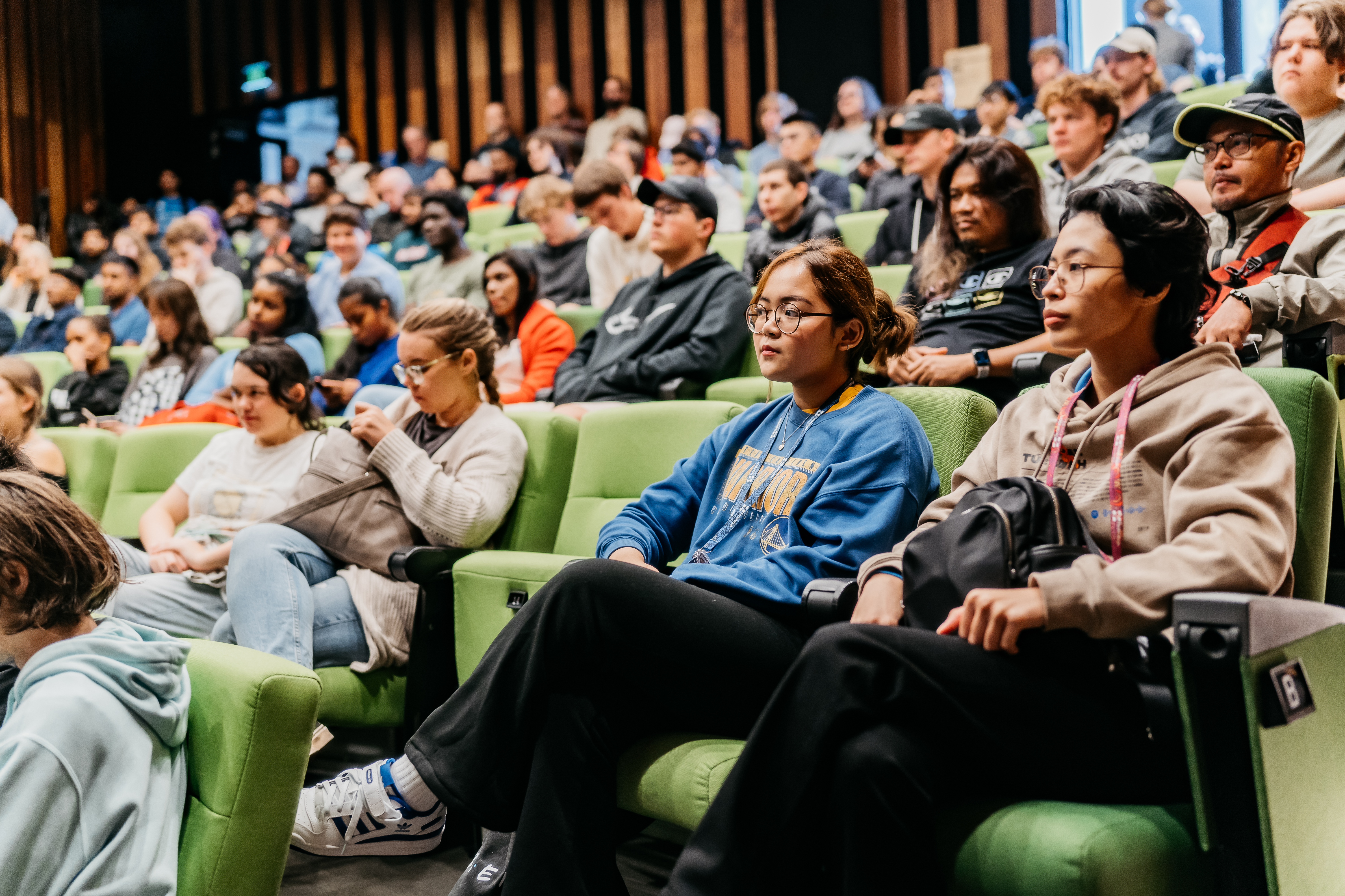 Photo of an auditorium full of students.