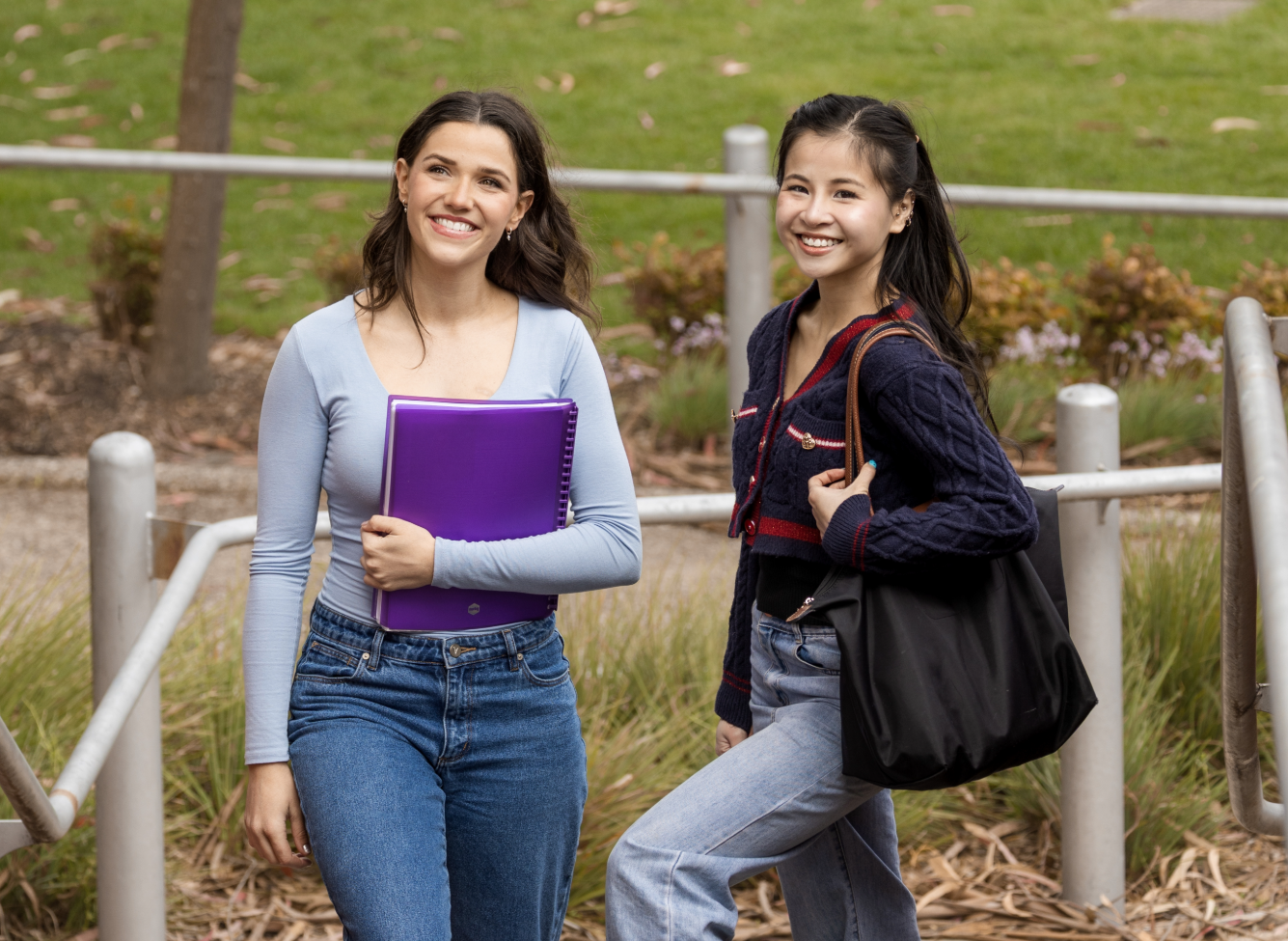 Two students standing outside